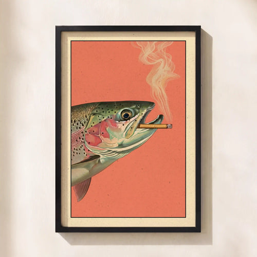 Framed wall art featuring a stylized trout with a cigarette in its mouth, set against a coral background with a cream mat and black frame, hanging on a light beige wall.