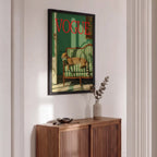 Framed Vogue magazine cover above a wooden sideboard with decorative items.