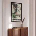 Wooden sideboard with a framed poster of Shiragumo Waterfall on a wall.