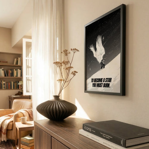 Living room with a framed poster on the wall, a vase, and books on a wooden cabinet.